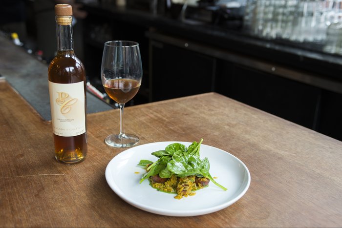 Duck sausage, rice, english peas, raisin, cumin, beer, spinach & Fernando de Castilla Palo Cortado Antique